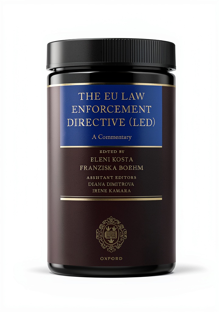 Installing Communications Law Comprehensive Guide OUP Oxford Kindle eBook on a wooden desk